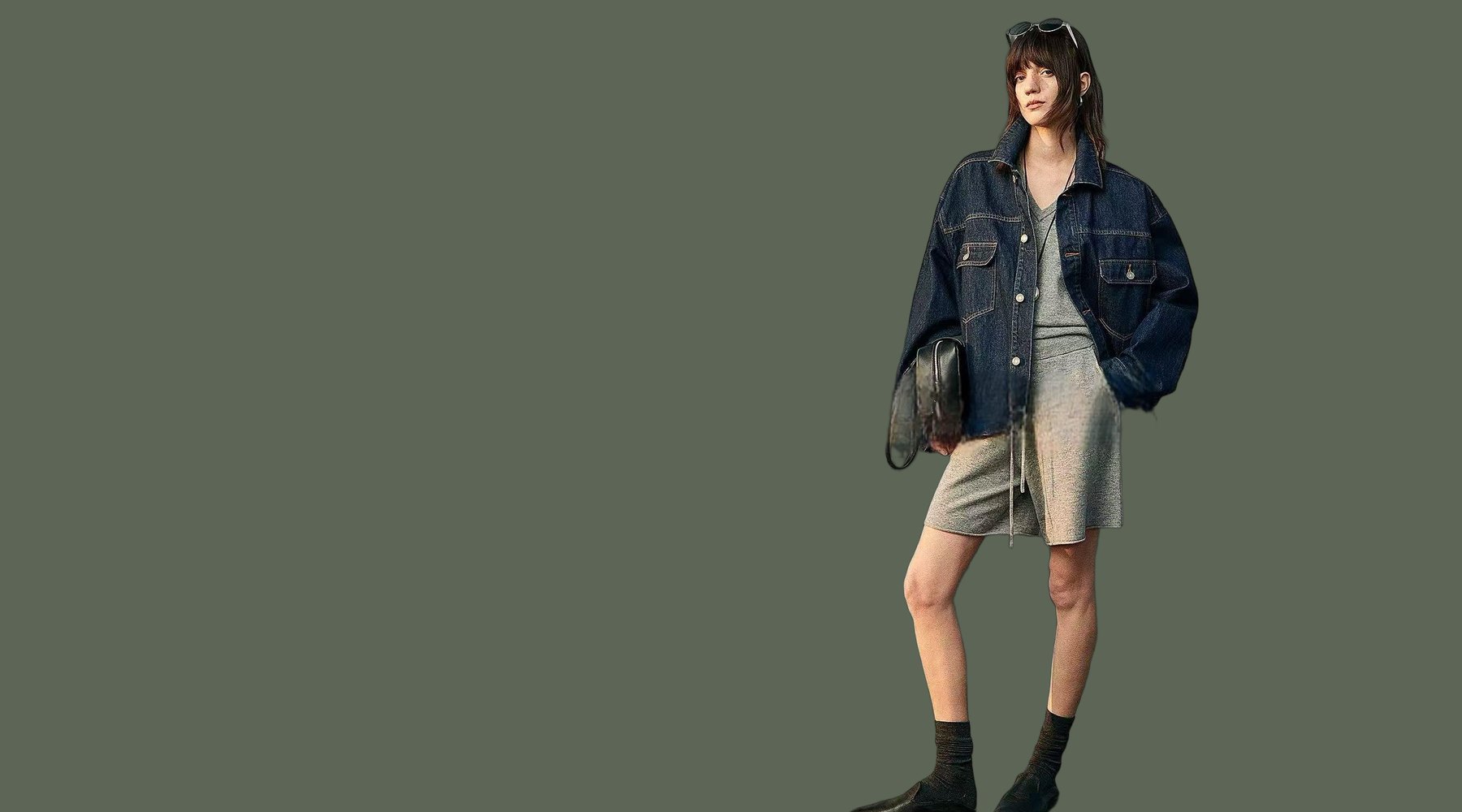 Model in denim and knitwear